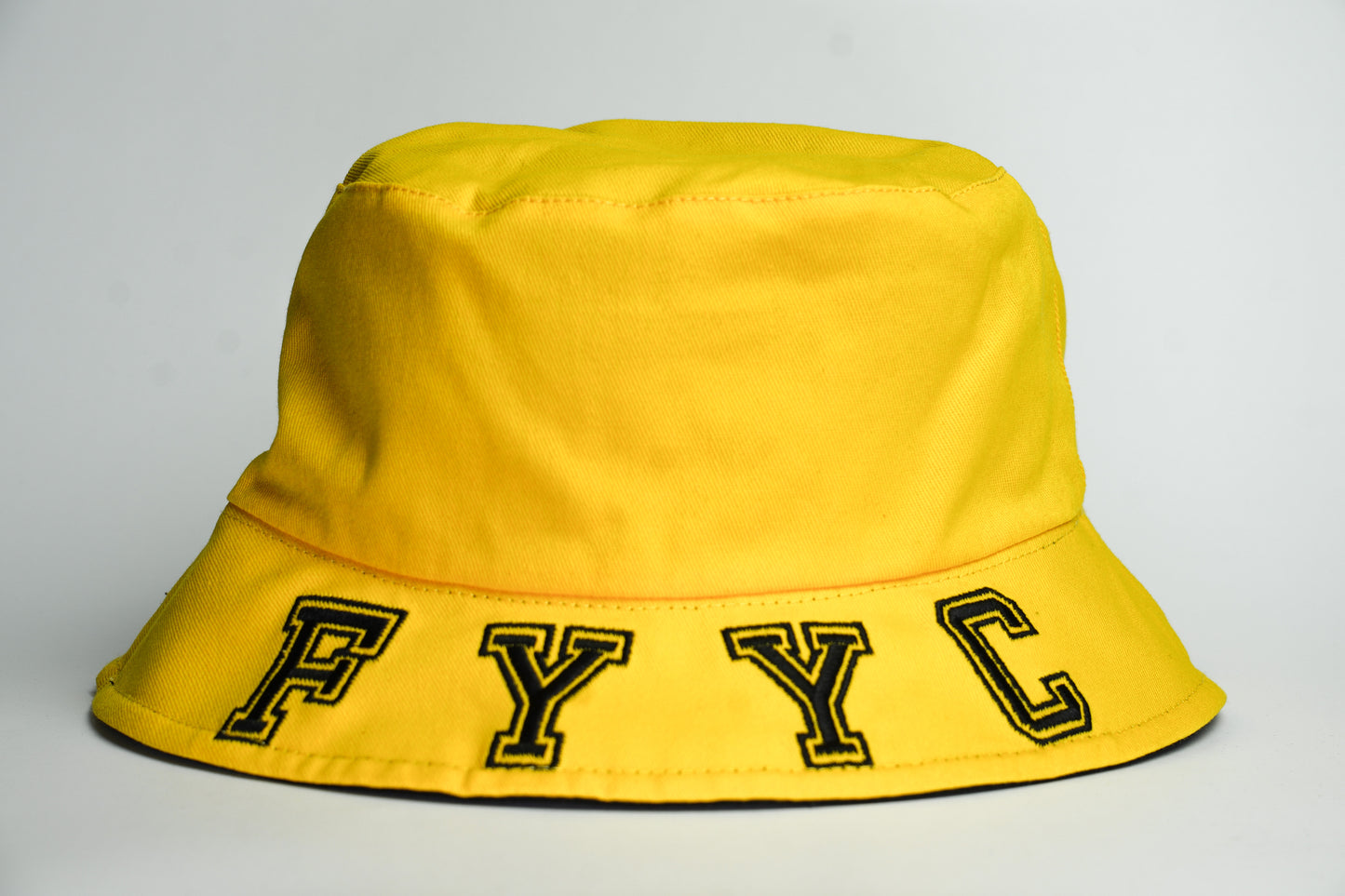 YELLOW AND BLACK BUCKET HAT